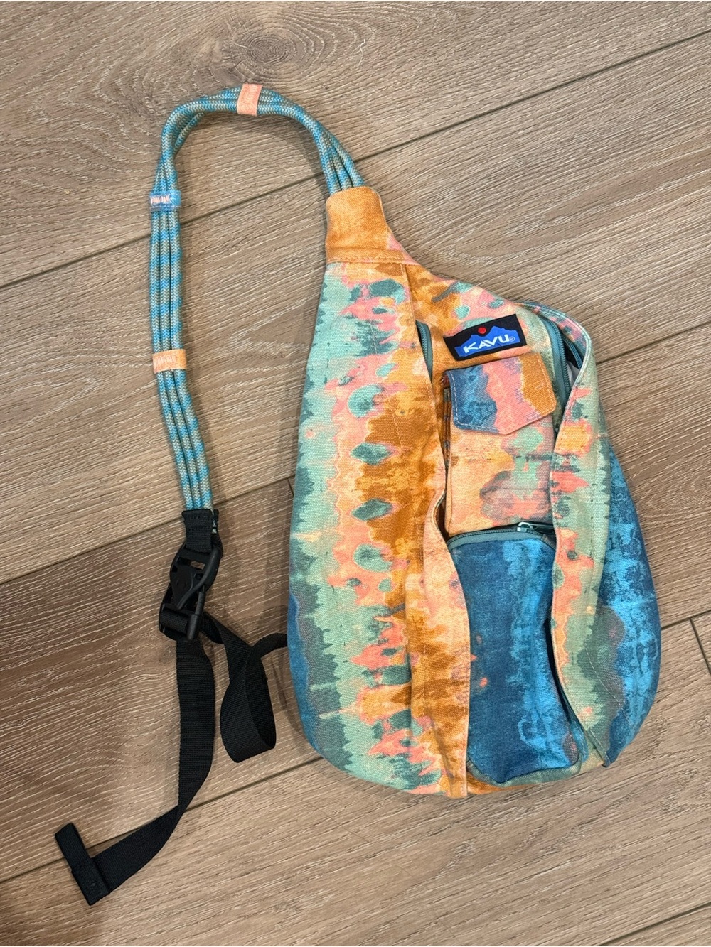 Kavu Tie-Dye Rope Sling Bag in Teal, Blue, Pink, & Brown